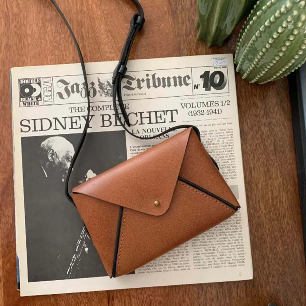 Nappa Dori Tan Envelope Sling